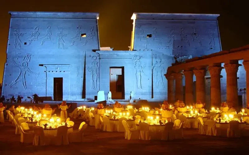 Philae Sound and Light Show audience — seated viewing area within the illuminated temple